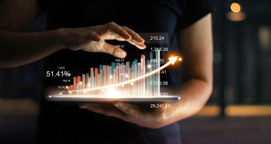 businessman-holding-tablet-showing-growing-virtual-hologram-statistics-graph-chart-with-arrow-up-min