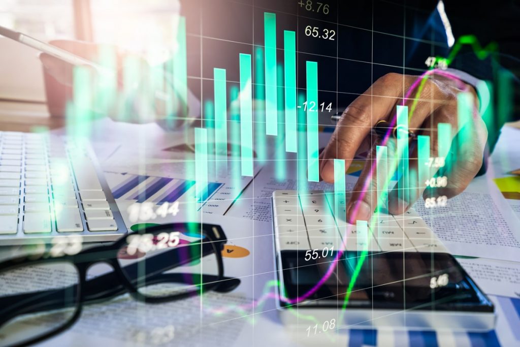 double-exposure-businessman-stock-market-forex-graph-min