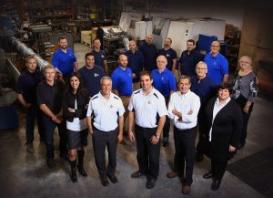 Pompco team group photo used in customer success story, highlighting reduced churn, increased sales penetration, and year-one growth with Grabb.AI.